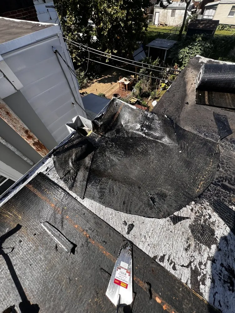 Slide of Dymond In The Ruff Roofing Repair