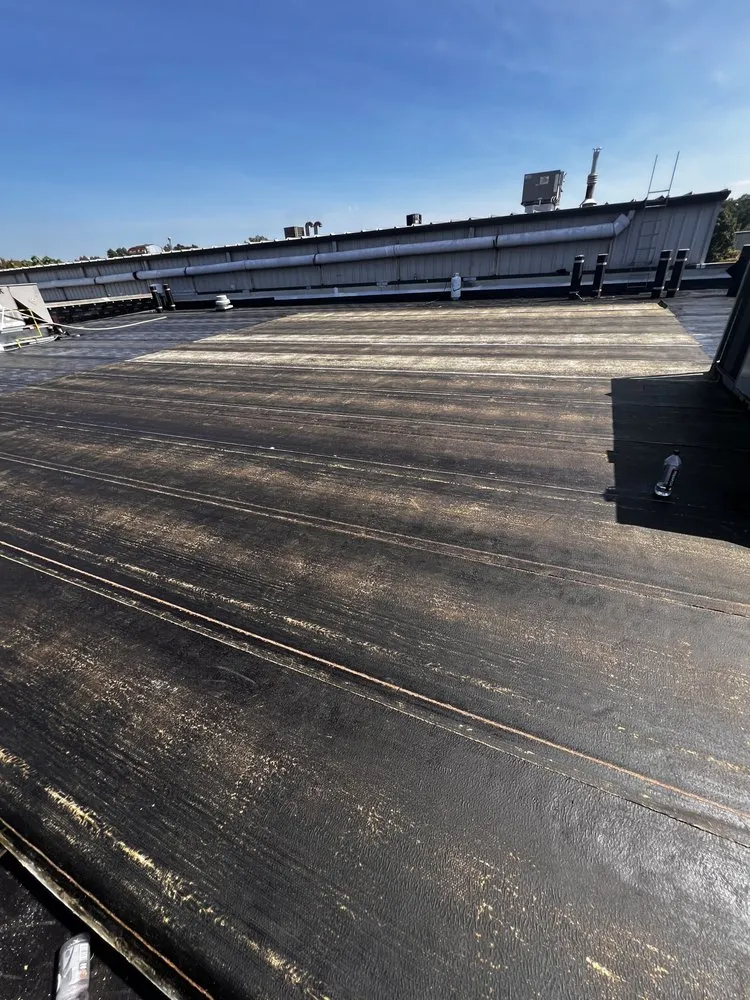 Slide of Dymond In The Ruff Roofing Repair