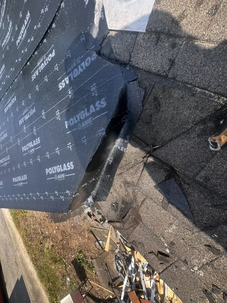 Slide of Dymond In The Ruff Roofing Repair