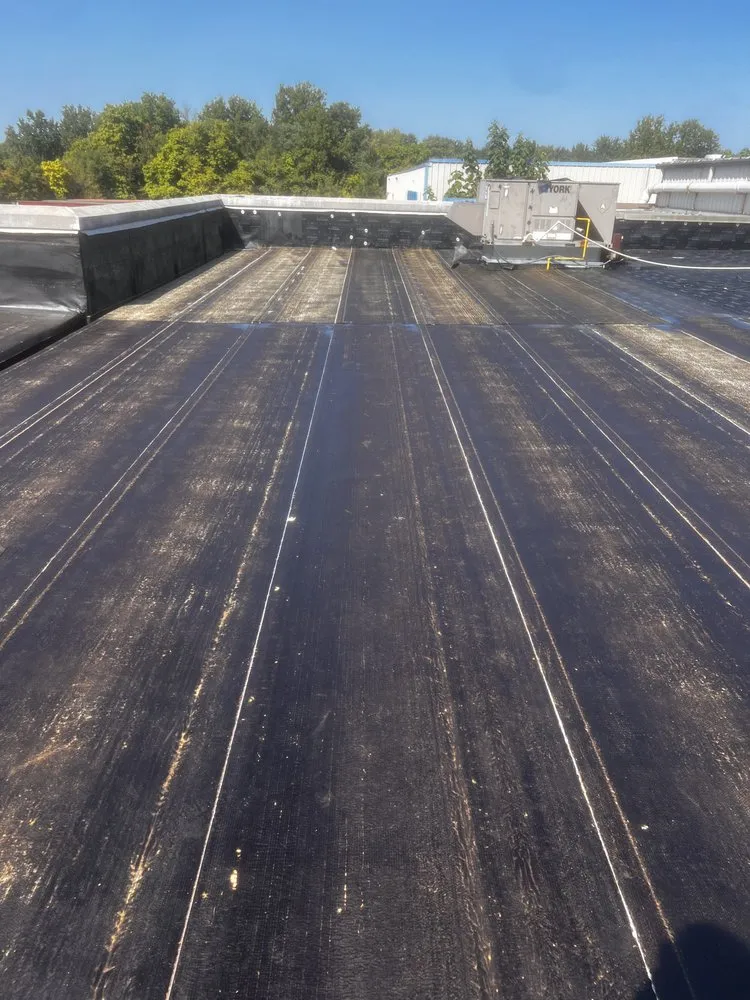 Slide of Dymond In The Ruff Roofing Repair