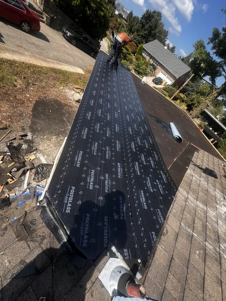 Slide of Dymond In The Ruff Roofing Repair