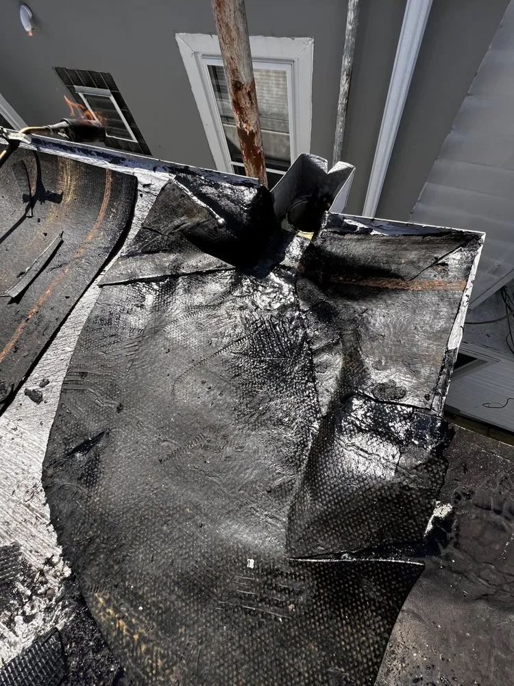 Slide of Dymond In The Ruff Roofing Repair