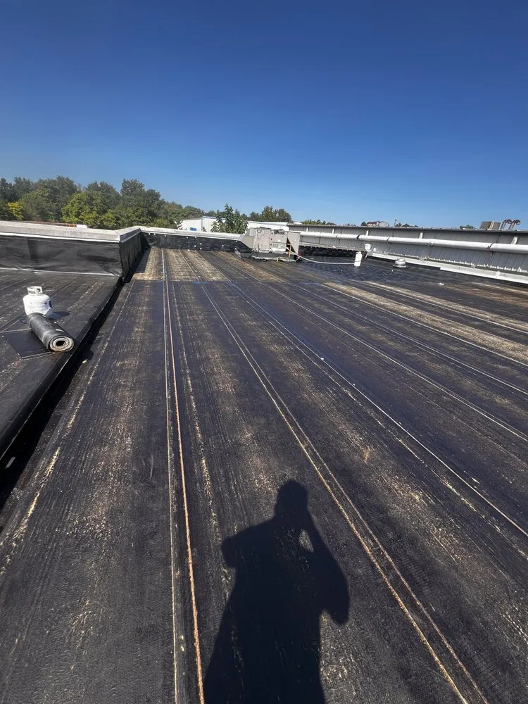 Slide of Dymond In The Ruff Roofing Repair