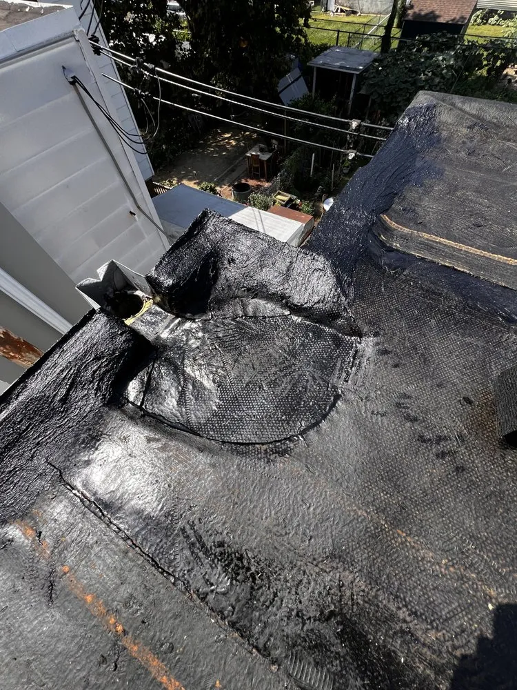 Slide of Dymond In The Ruff Roofing Repair