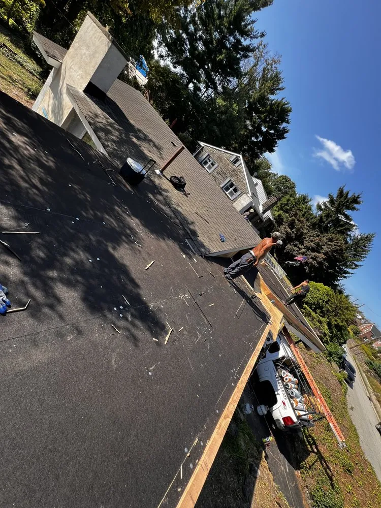 Slide of Dymond In The Ruff Roofing Repair