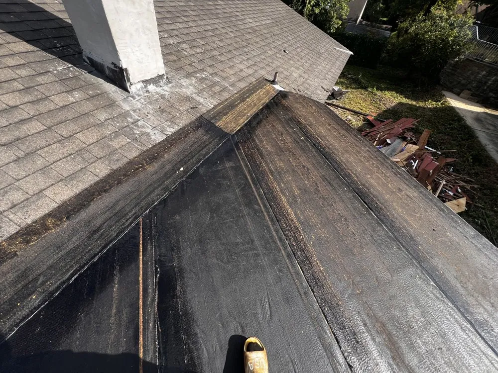 Slide of Dymond In The Ruff Roofing Repair