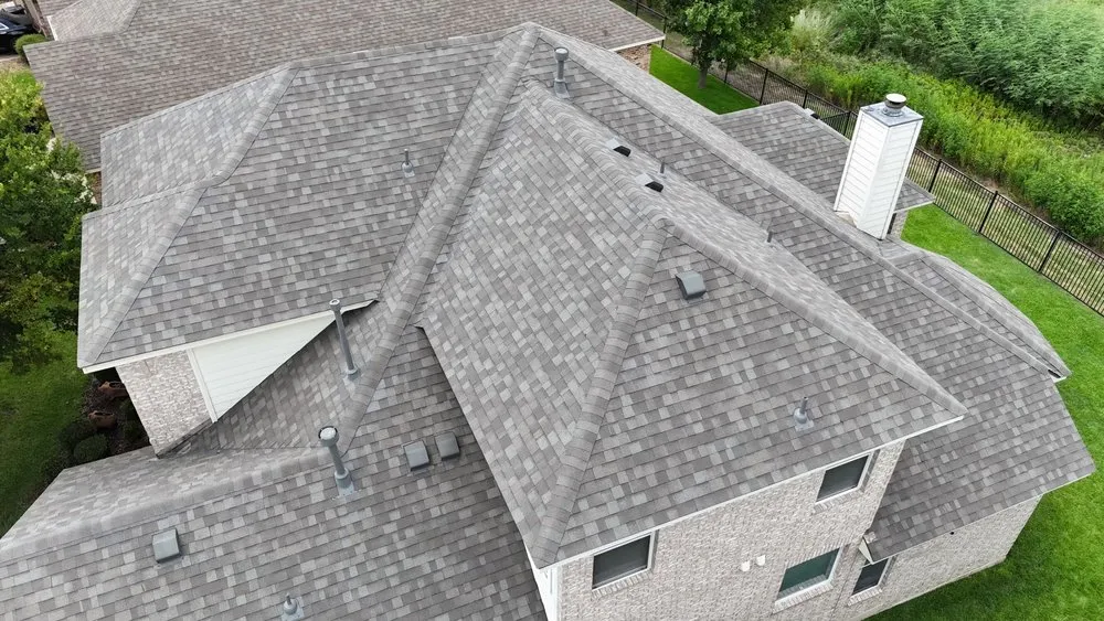 Slide of Dynamis Roofing