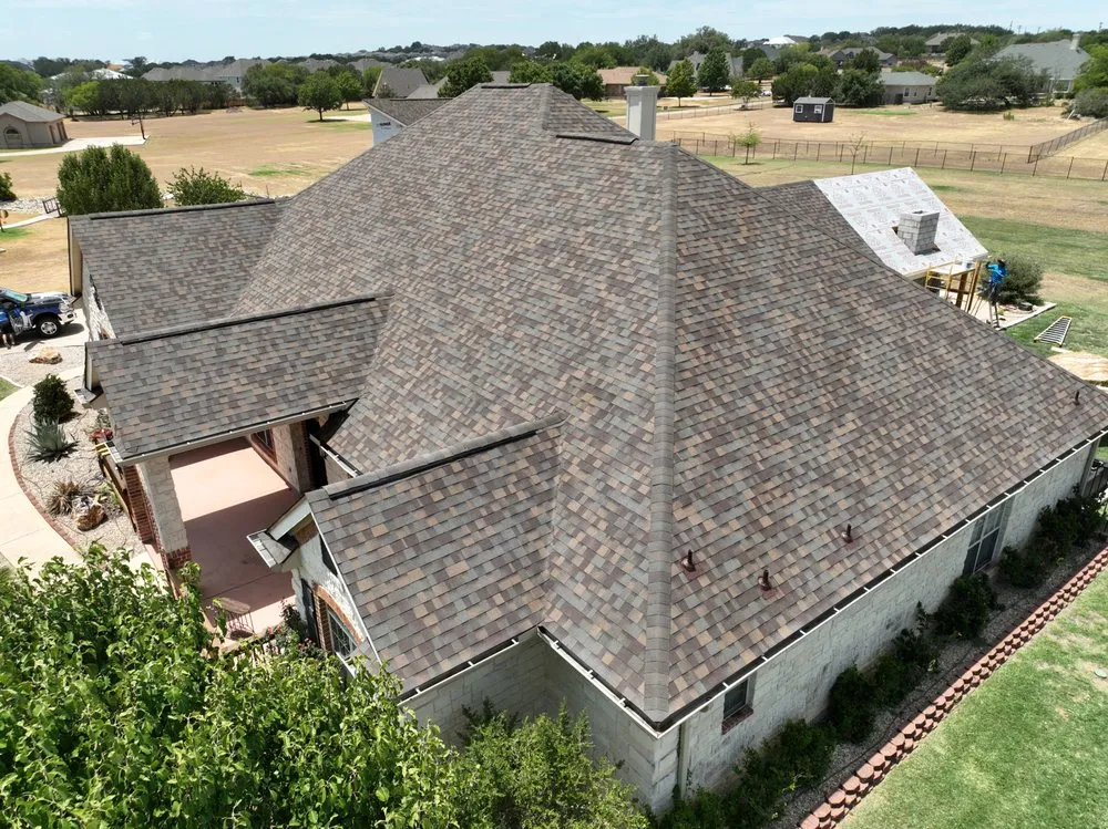 Slide of Dynamite  Roofing & Construction