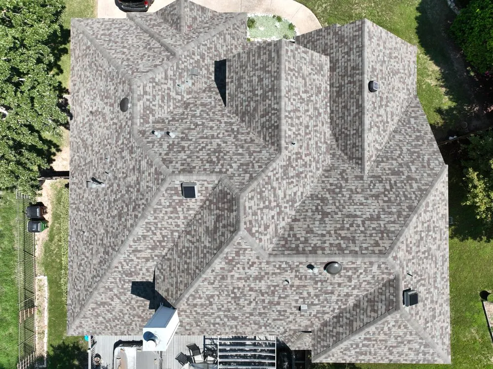 Slide of Dynamite  Roofing & Construction