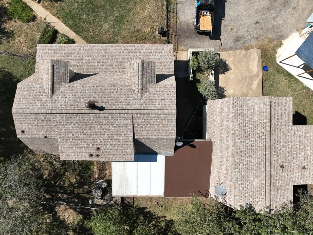 Slide of Dynamite  Roofing & Construction