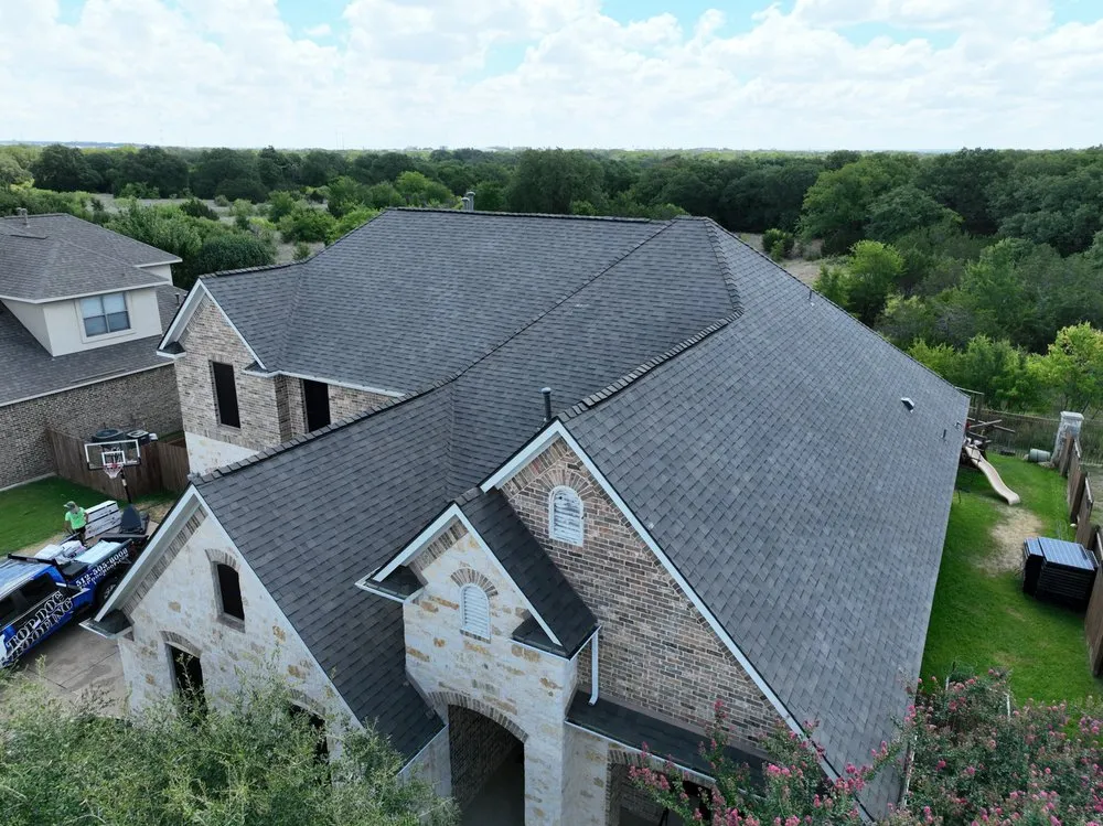 Slide of Dynamite  Roofing & Construction