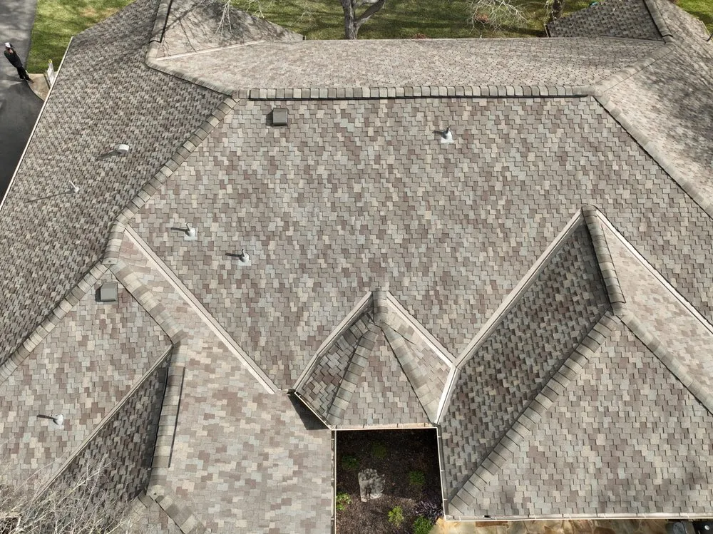 Slide of Dynamite  Roofing & Construction