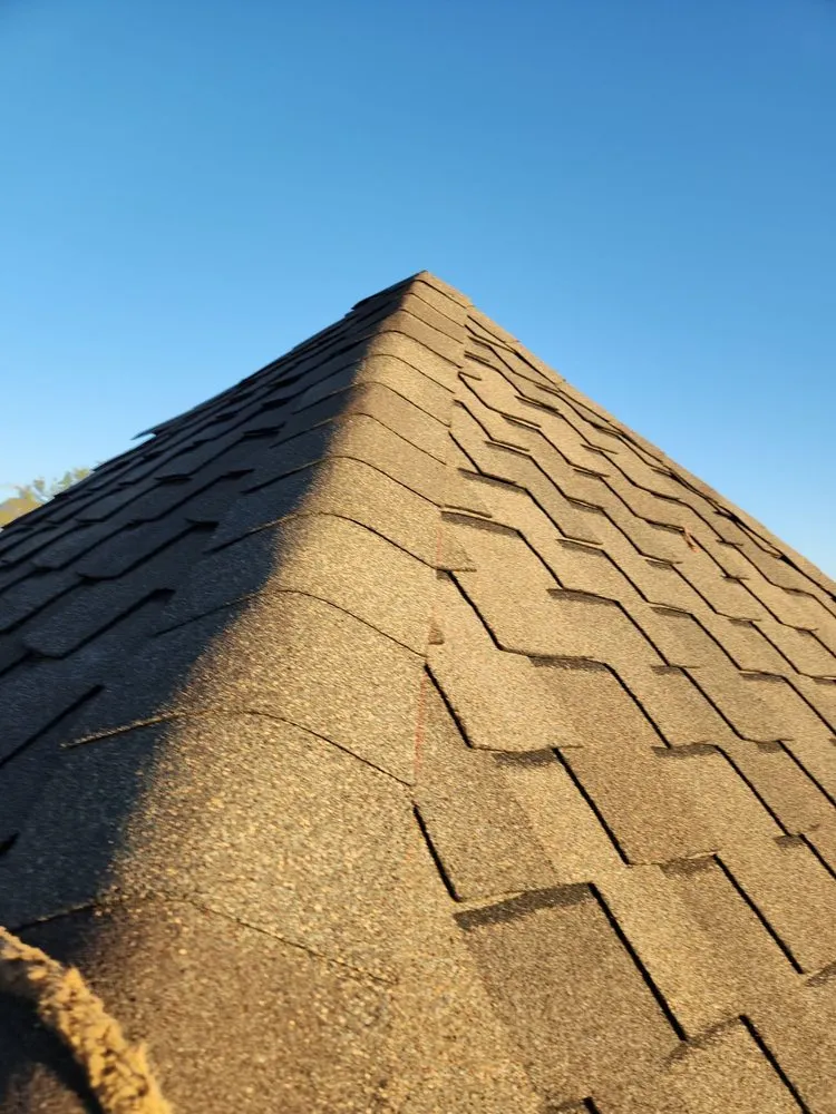 Slide of Dynamite Roofing