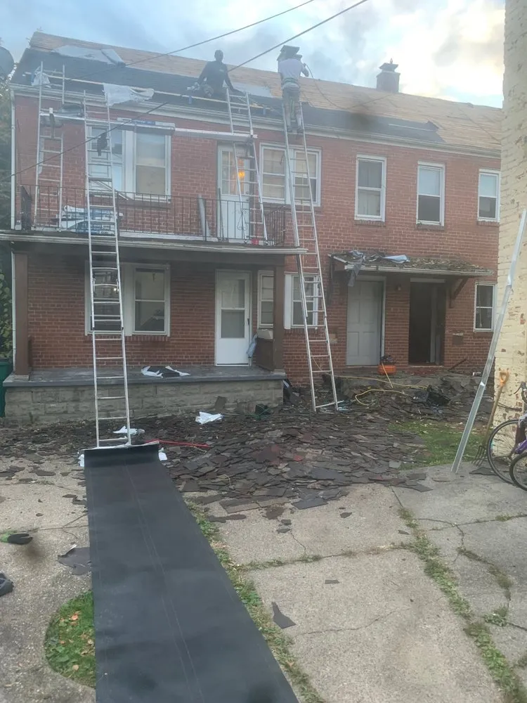 Slide of Dynasty Demolition and Roofing