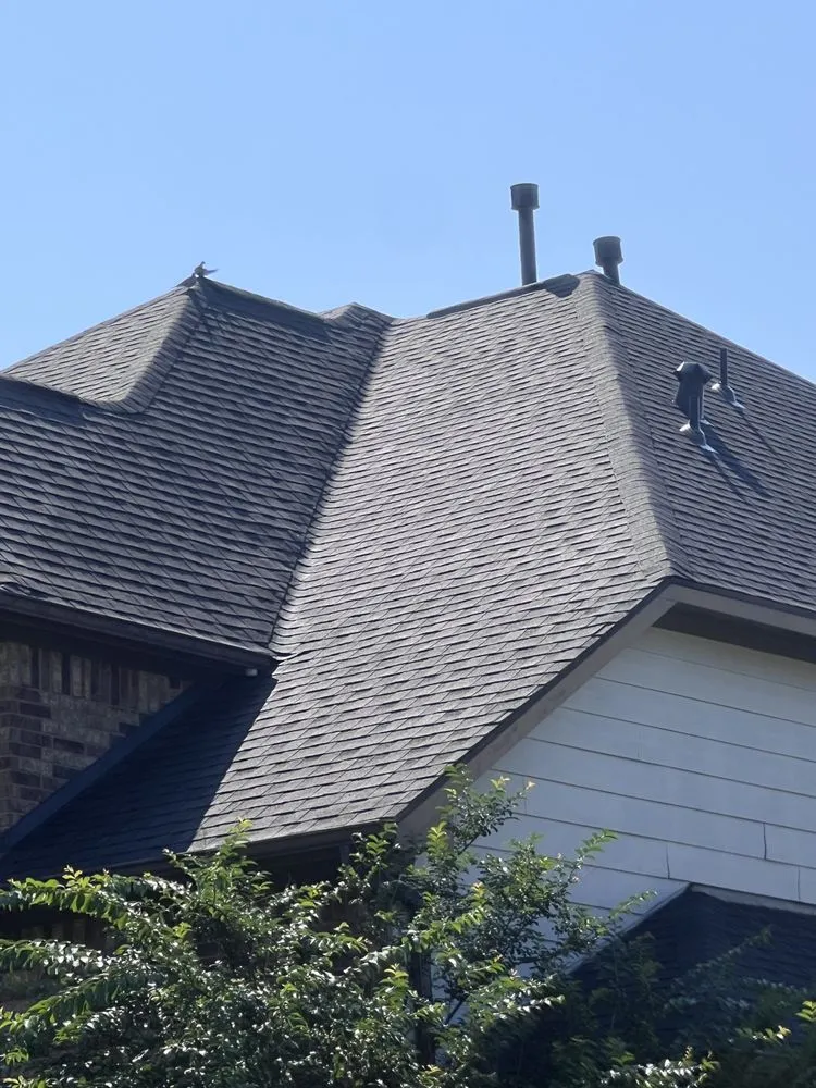 Slide of Dynasty Roofing and Construction