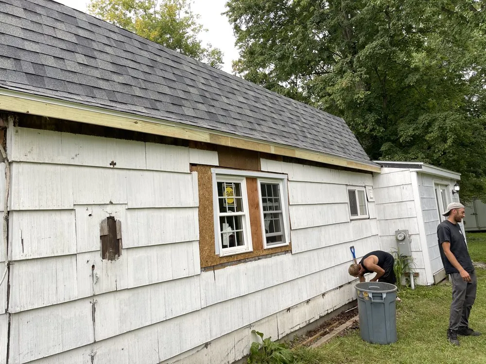 Slide of Dynasty Roofing