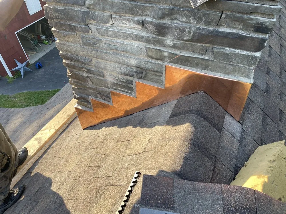 Slide of Dynasty Roofing