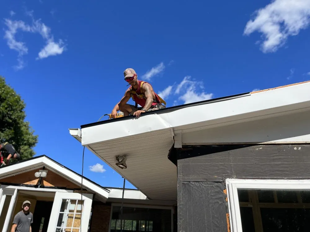 Slide of Dynasty Roofing