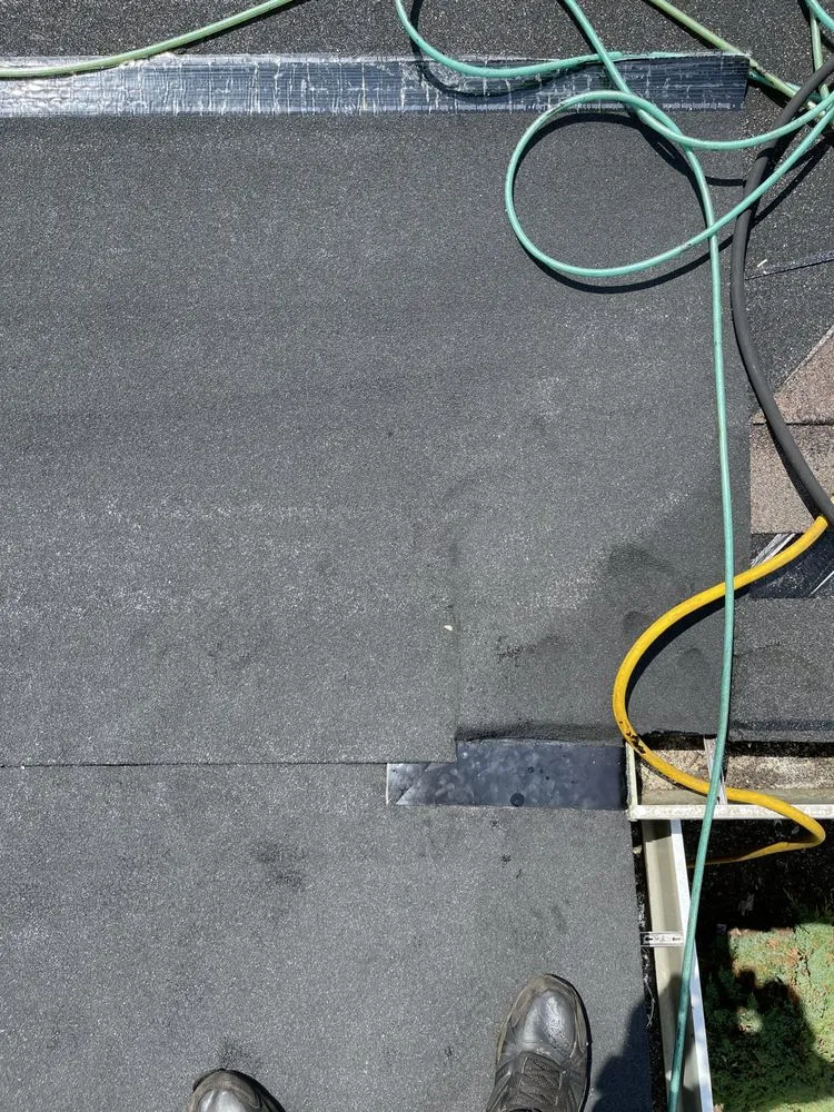 Slide of Dynasty Roofing