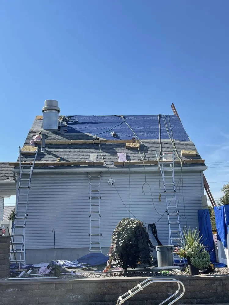 Slide of Dynasty Roofing