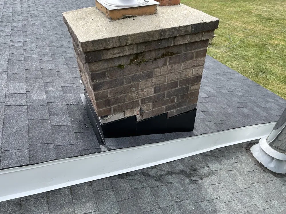 Slide of Dynasty Roofing