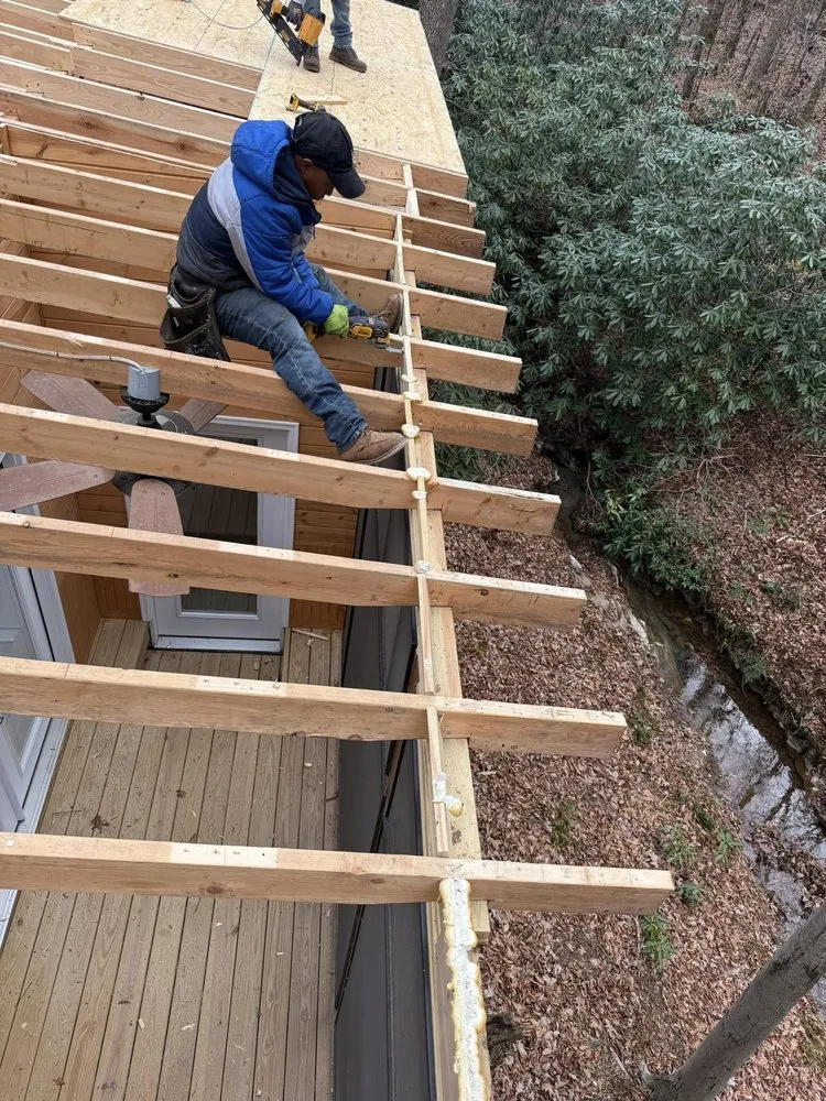 Slide of Dynasty Roofing