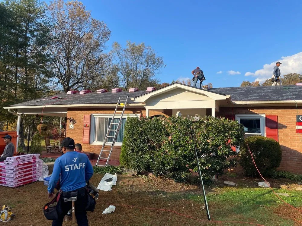 Slide of Dynasty Roofing