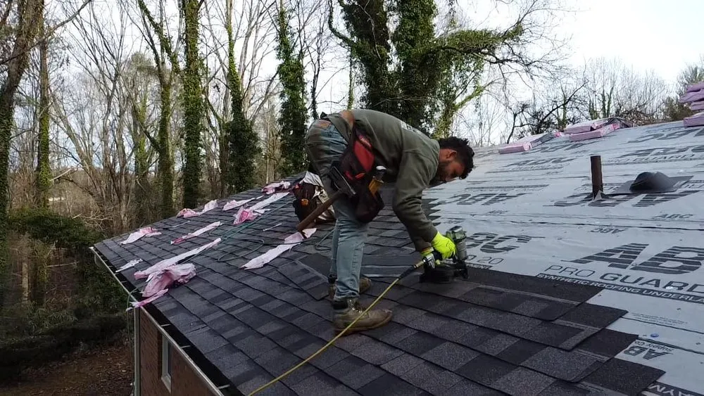 Slide of Dynasty Roofing