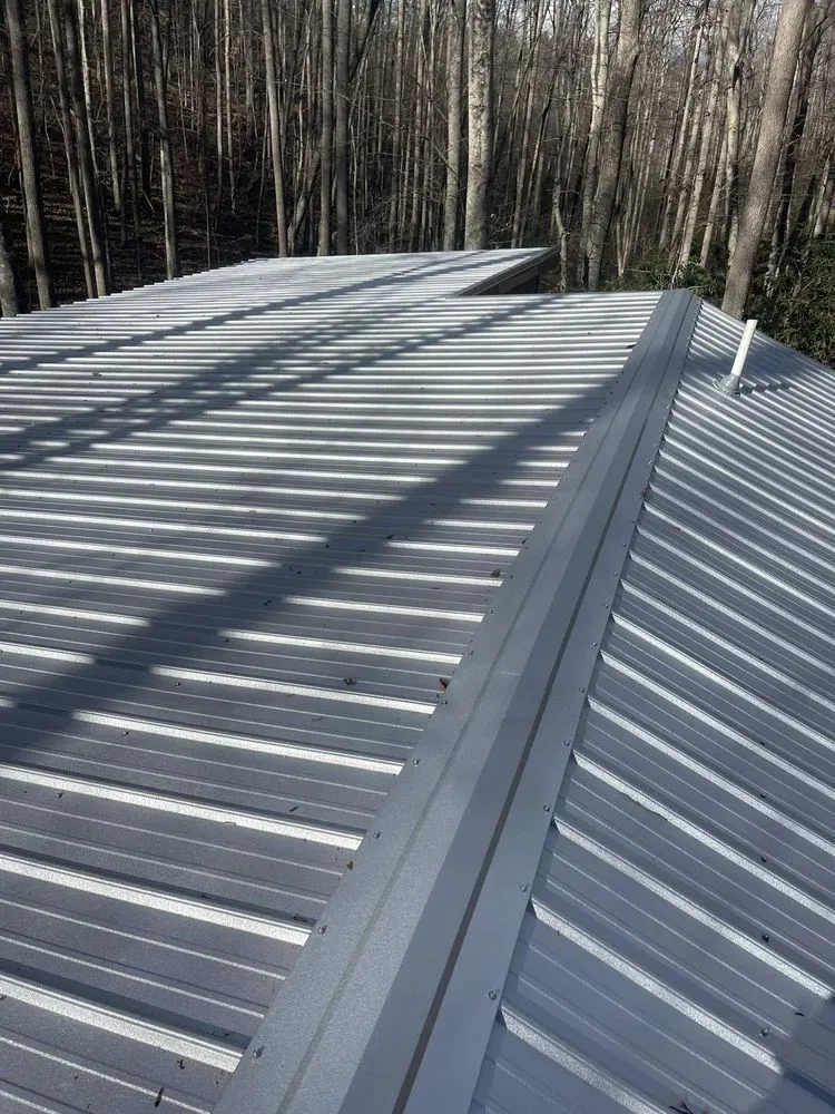 Slide of Dynasty Roofing