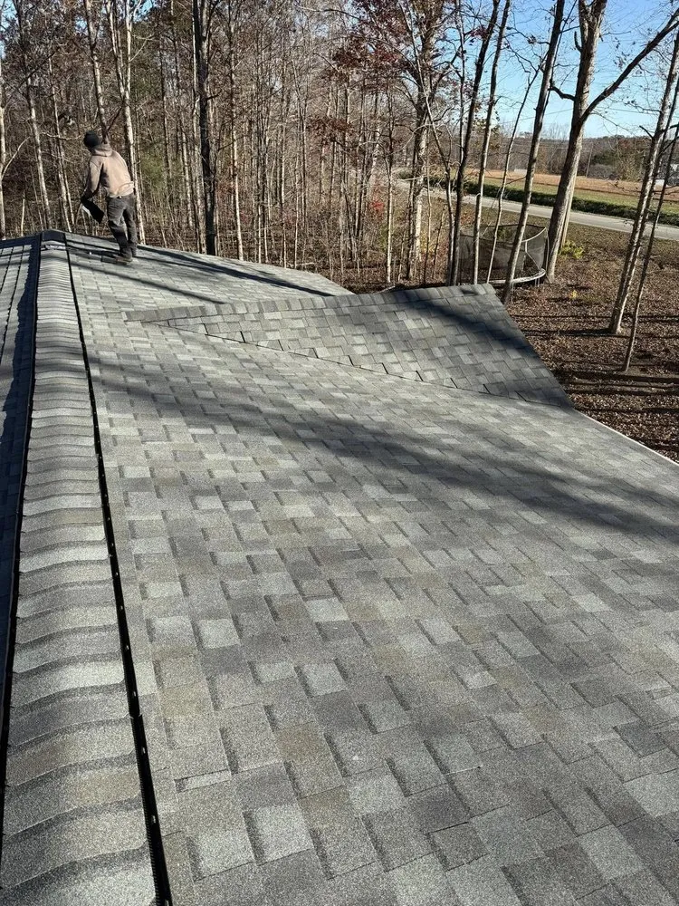 Slide of Dynasty Roofing