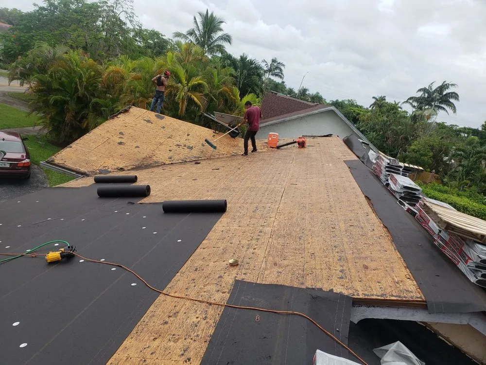 Slide of Dynasty Roofing