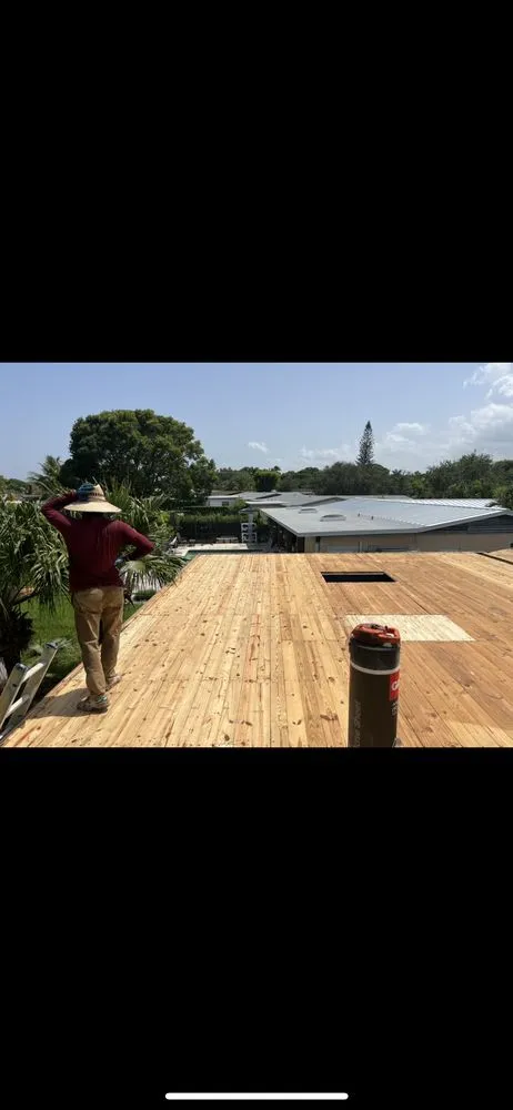 Slide of Dynasty Roofing