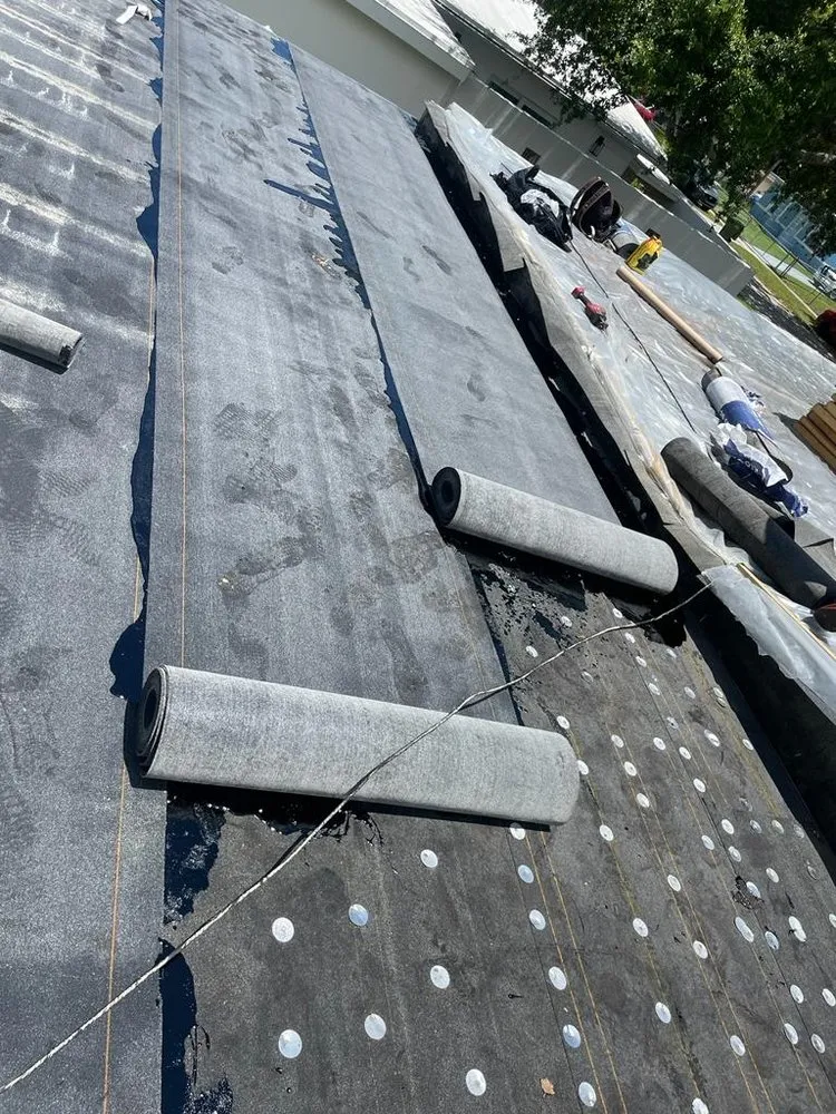 Slide of Dynasty Roofing