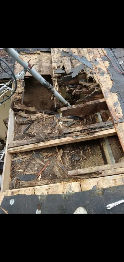 Slide of Dynasty Roofing