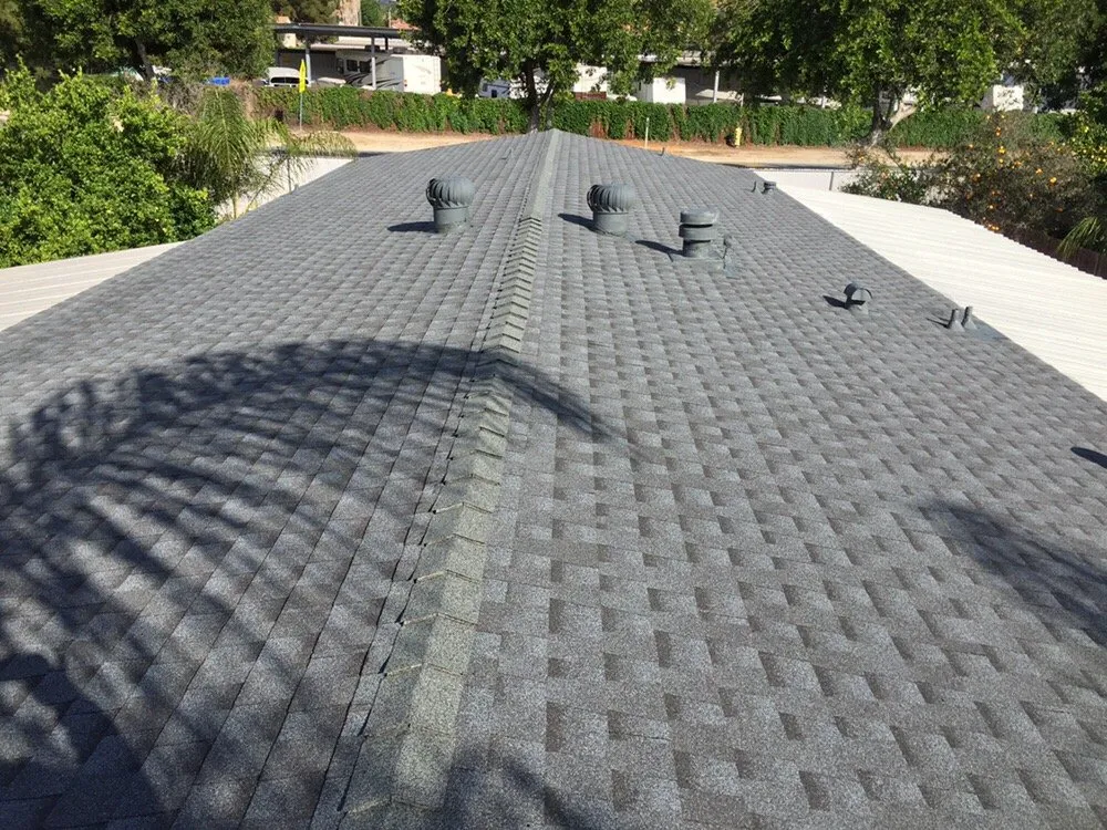 Slide of E & E Roofing