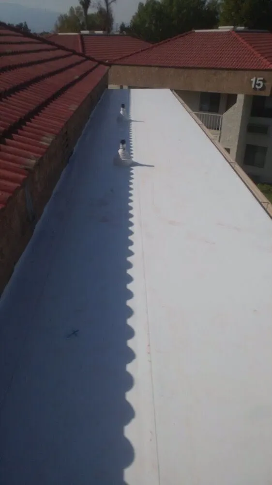 Slide of E & E Roofing