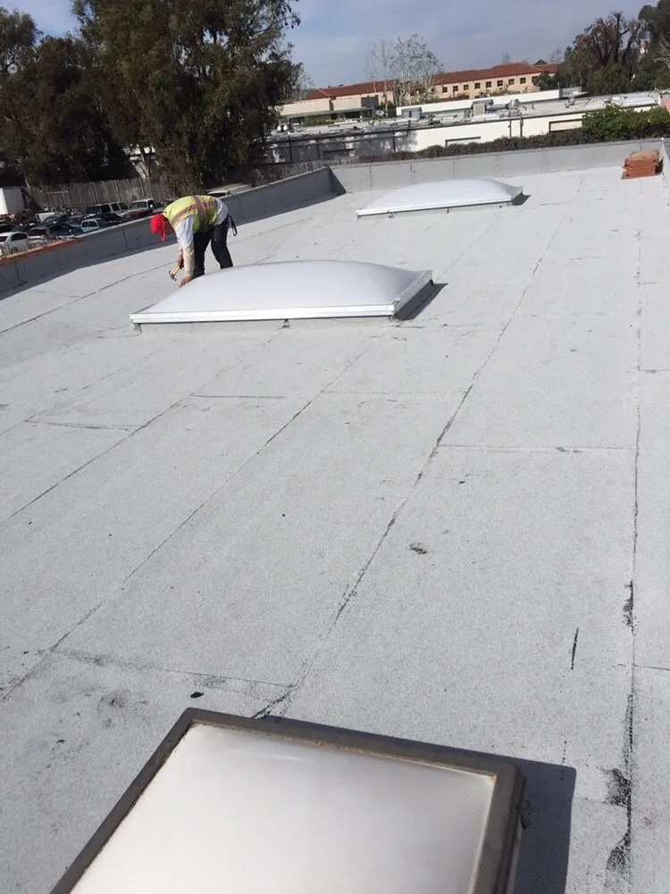 Slide of E & E Roofing