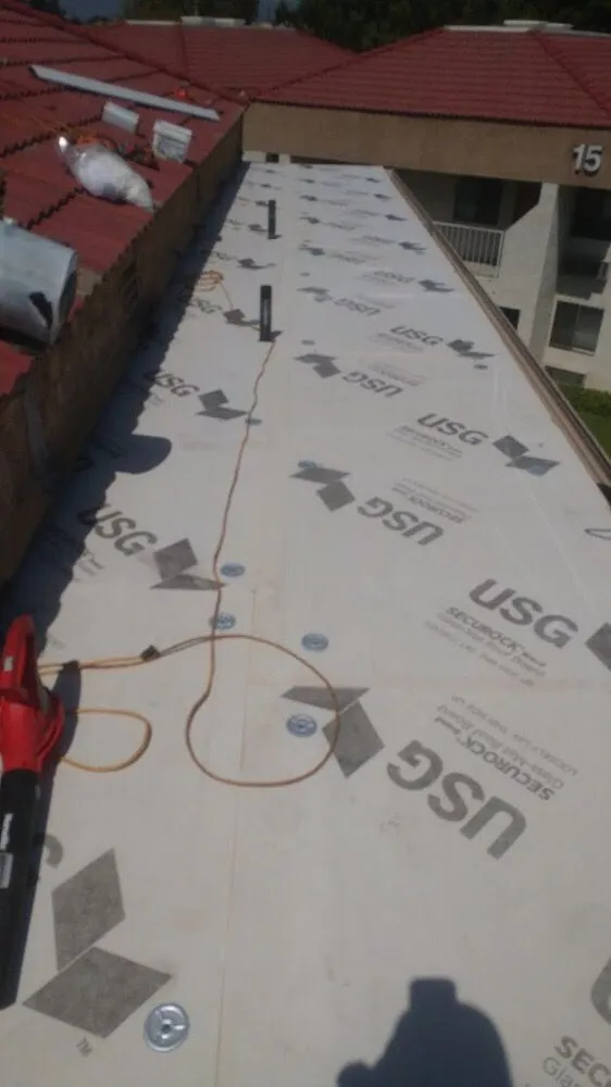 Slide of E & E Roofing