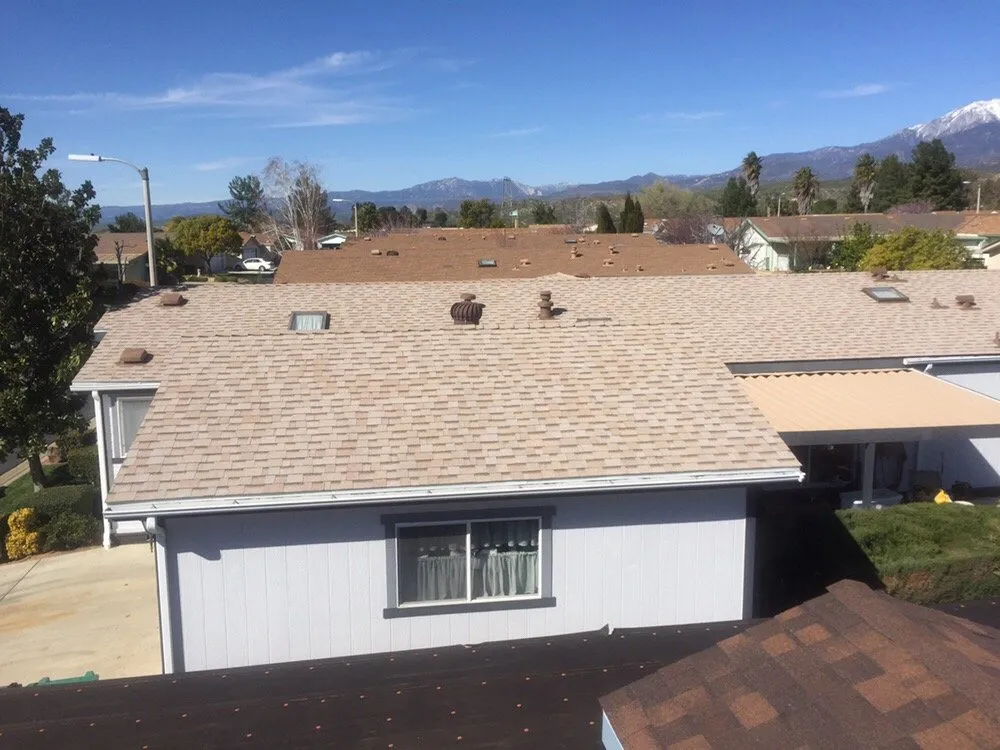 Slide of E & E Roofing