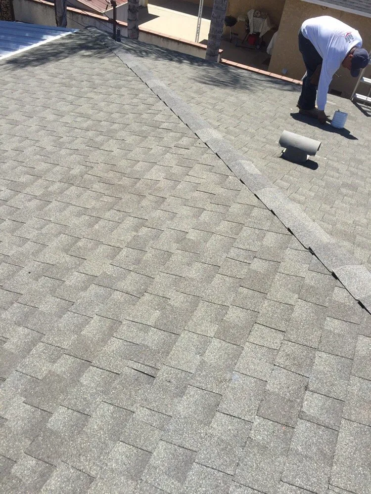 Slide of E & E Roofing