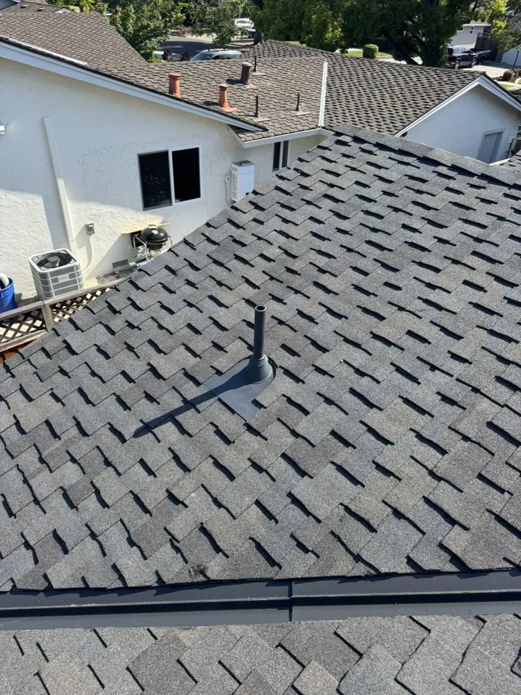Slide of E & E Roofing