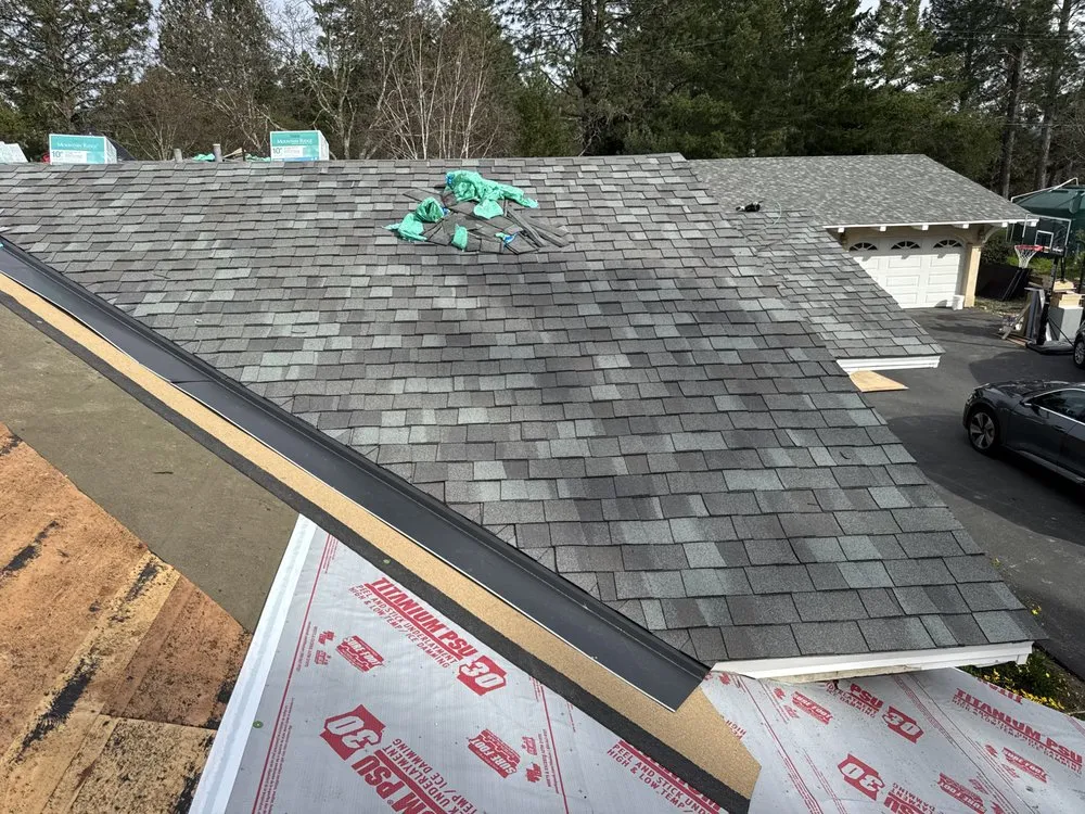 Slide of E & E Roofing