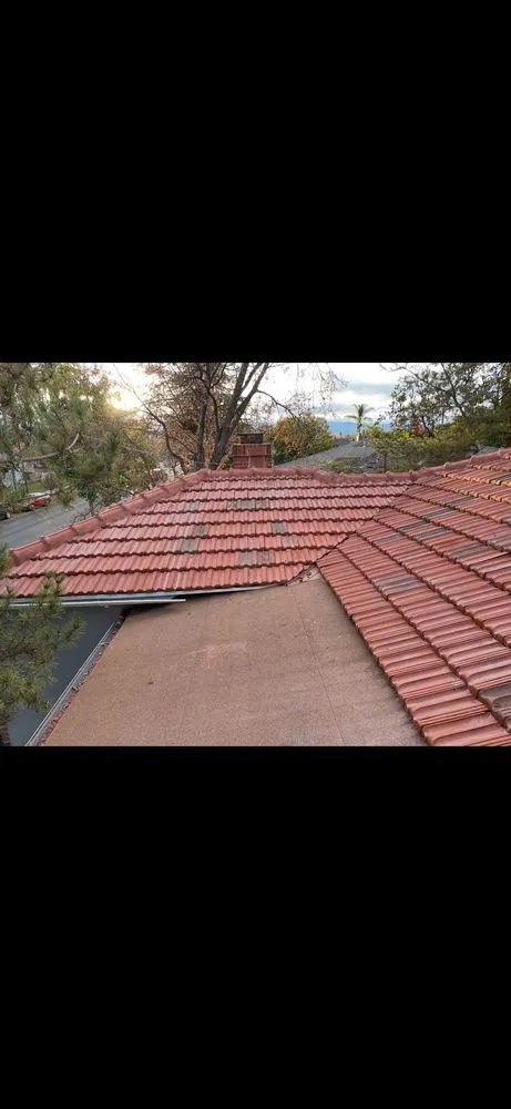 Slide of E & E Roofing