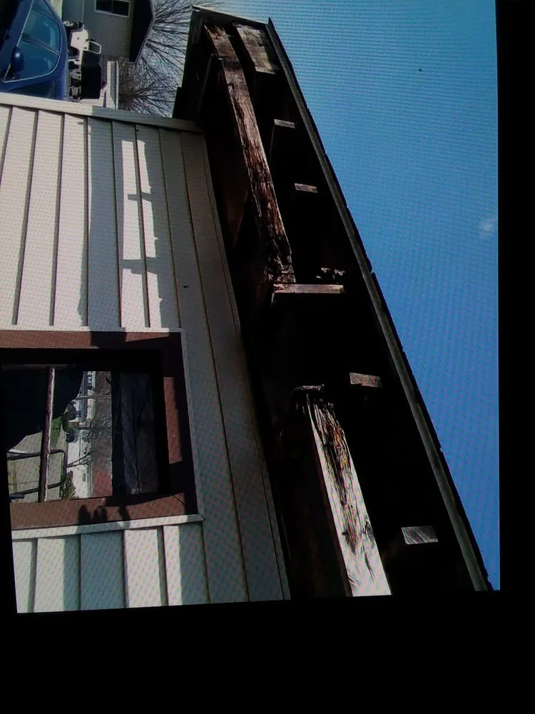 Slide of E & J Home Improvements