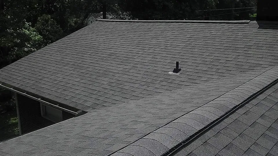 Slide of E & J Roofing