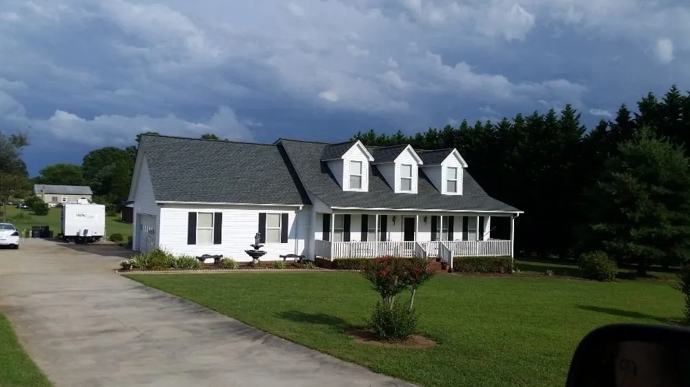 Slide of E & J Roofing