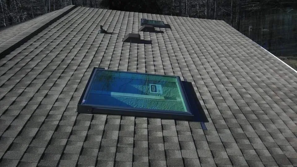 Slide of E & J Roofing