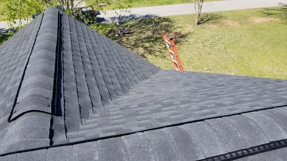 Slide of E & J Roofing