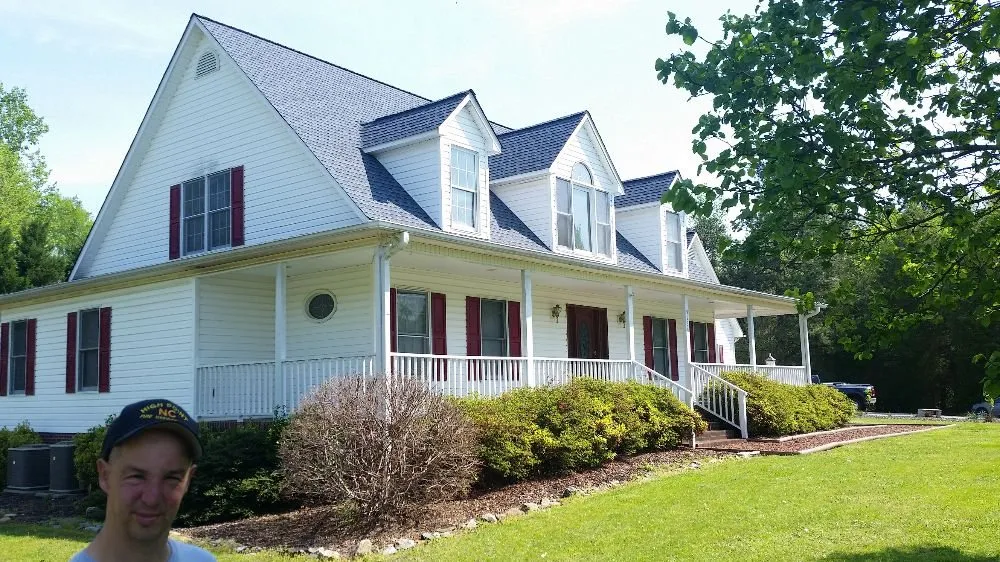 Slide of E & J Roofing