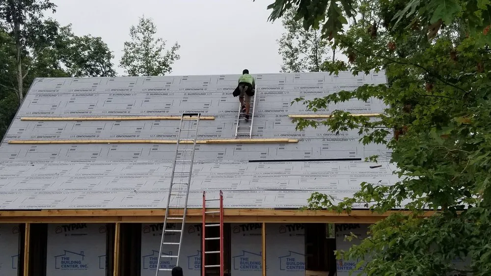 Slide of E & J Roofing